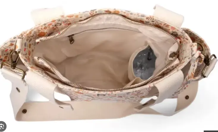 bolso maternidad rosa.webp